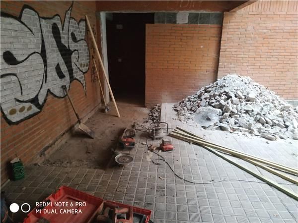 1 apertura de hueco en la fachada y demolicin de suelo